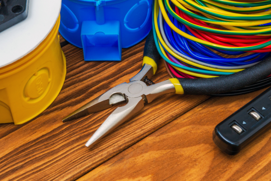 Electrical contractor working on a ground-up commercial construction project